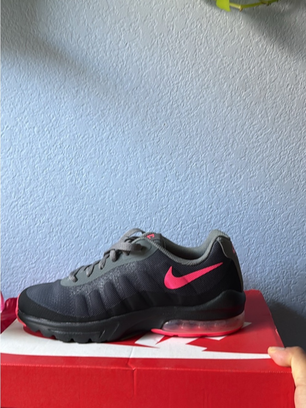 Nike women’s Grey Athletic Sneakers with Pink Swoosh